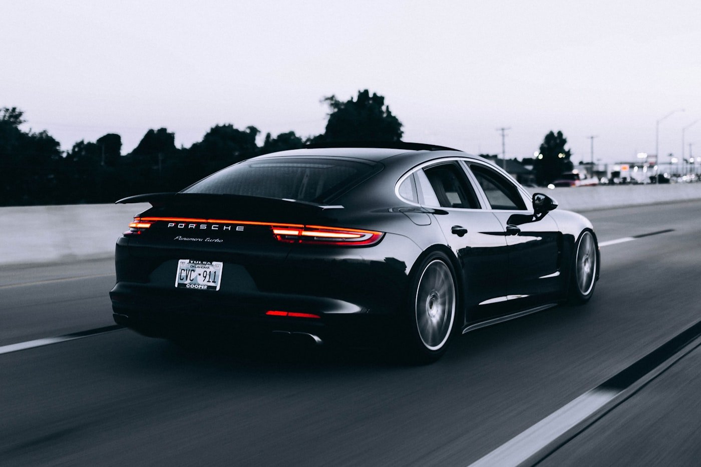 Porsche Panamera Turbo S, Project Monolith, black widebody sedan in motion